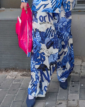 Pantalone seta simboli e leggende blu